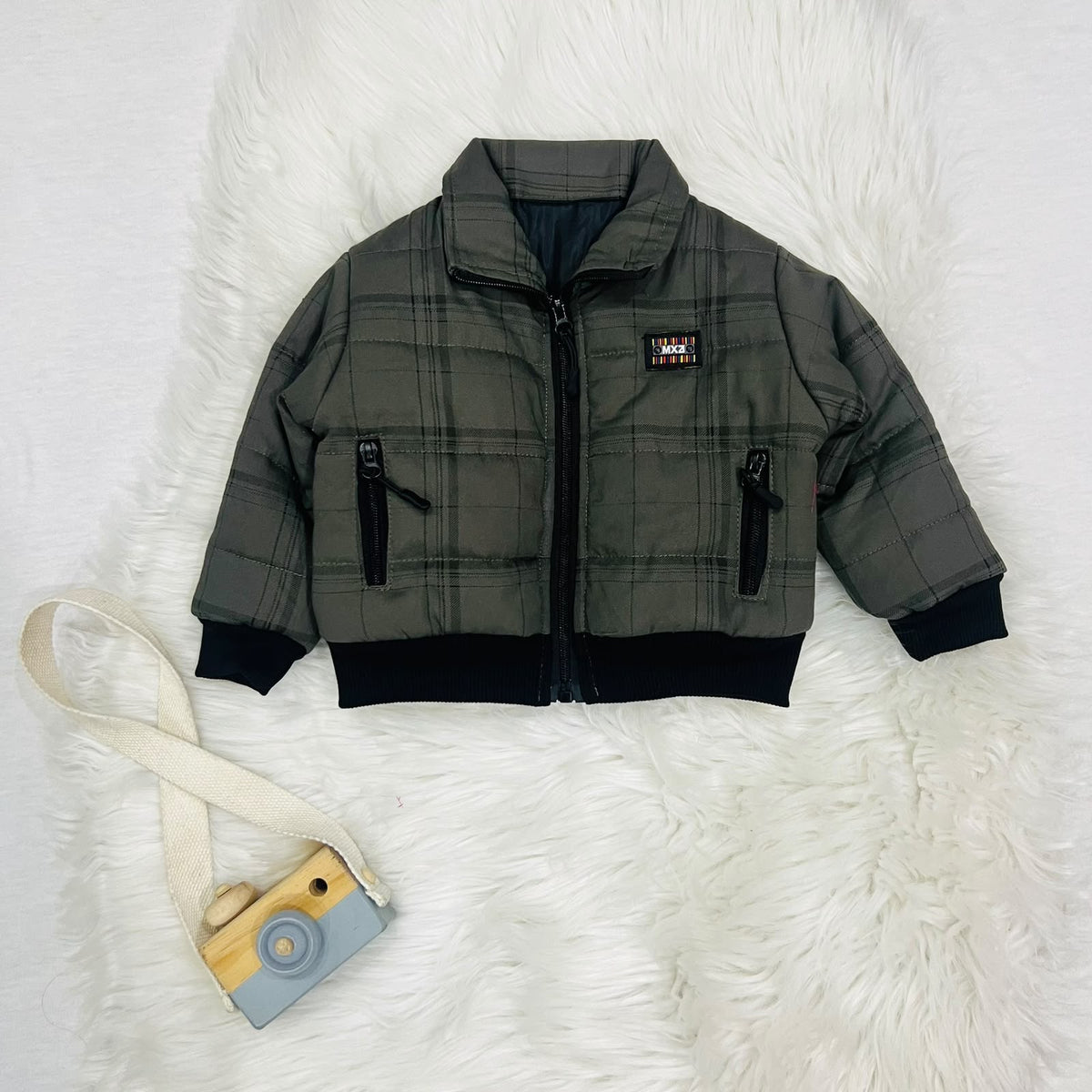 Cozy season, but make it cool. ⚡️ Keep your little one warm and effortlessly stylish in this plaid puffer jacket and cargo fleece winter pants set