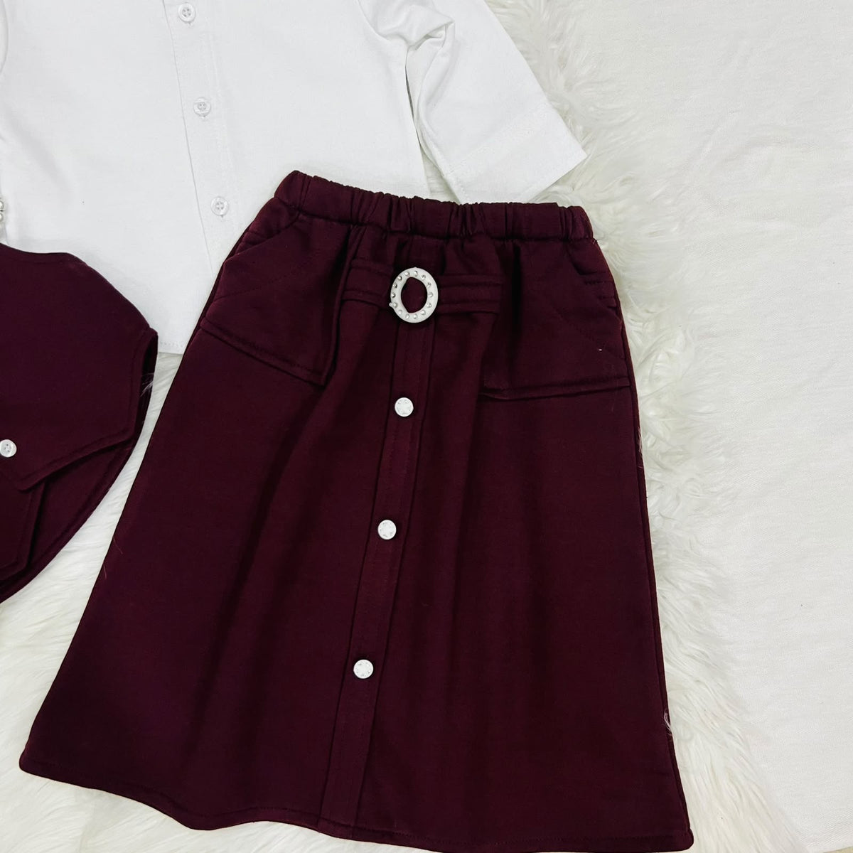 The ultimate 3-piece formal set: crisp white collared shirt, burgundy vest, and matching  long  skirt fleece stuff