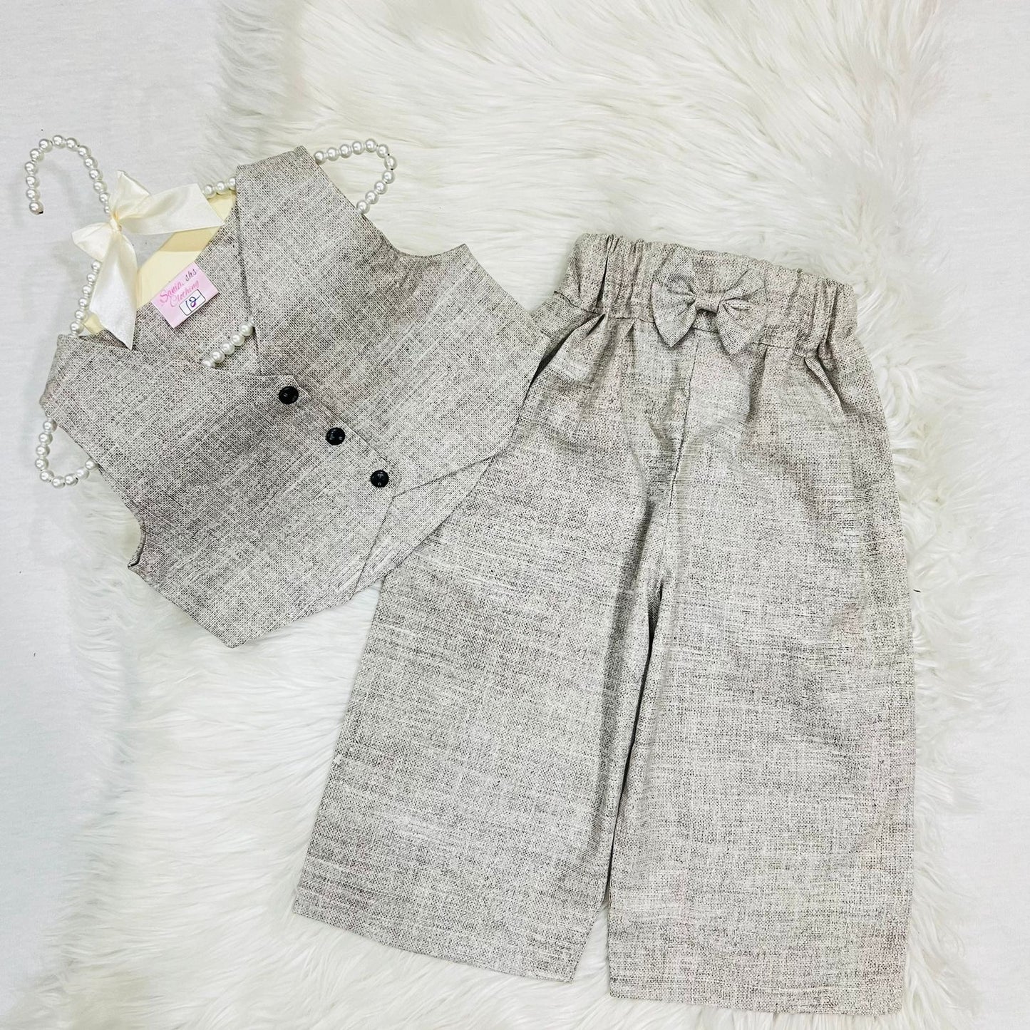 Girls' 3-piece outfit featuring a black long-sleeve button-down shirt paired with an beige textured button vest and matching wide-leg trousers cotton stuff
