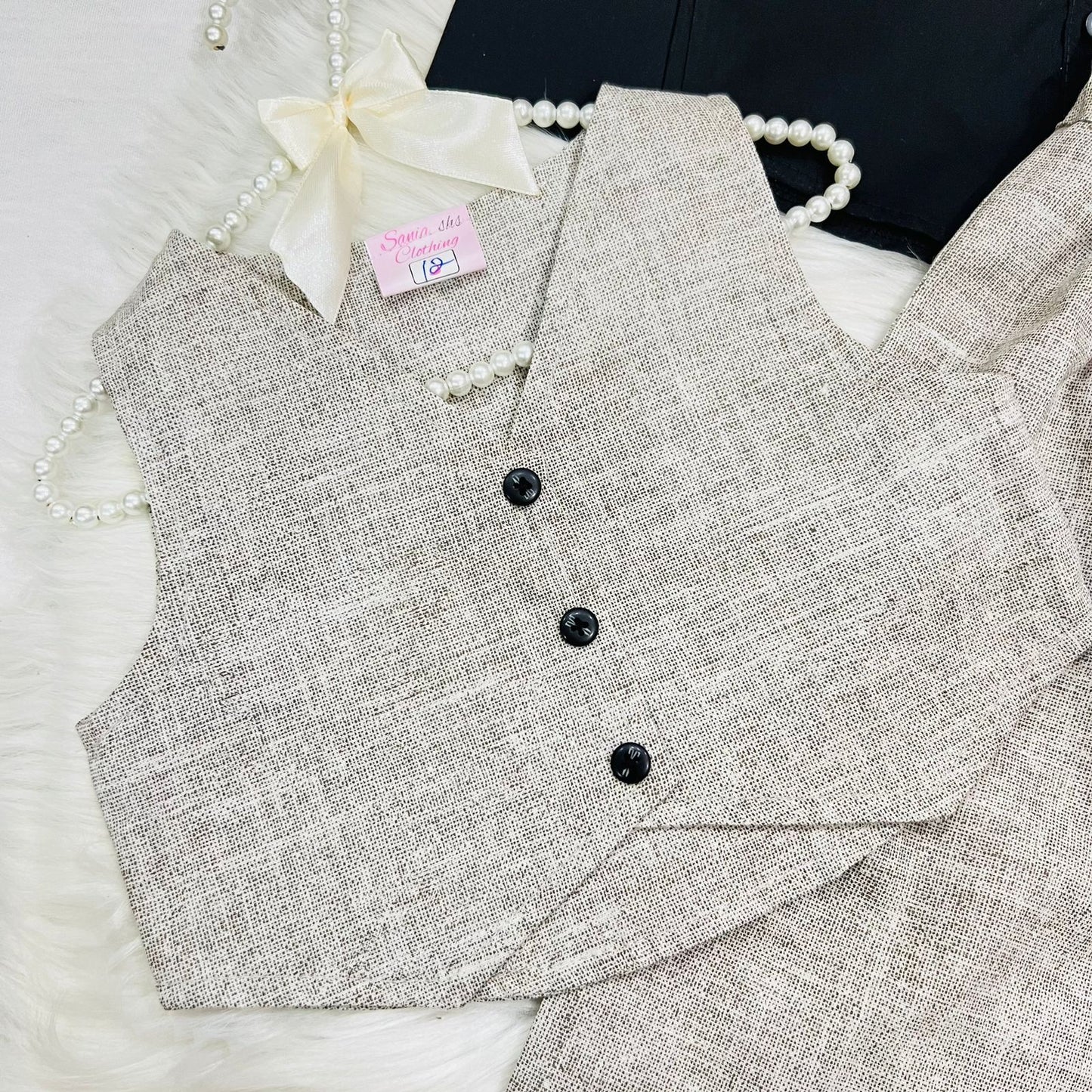 Girls' 3-piece outfit featuring a black long-sleeve button-down shirt paired with an beige textured button vest and matching wide-leg trousers cotton stuff