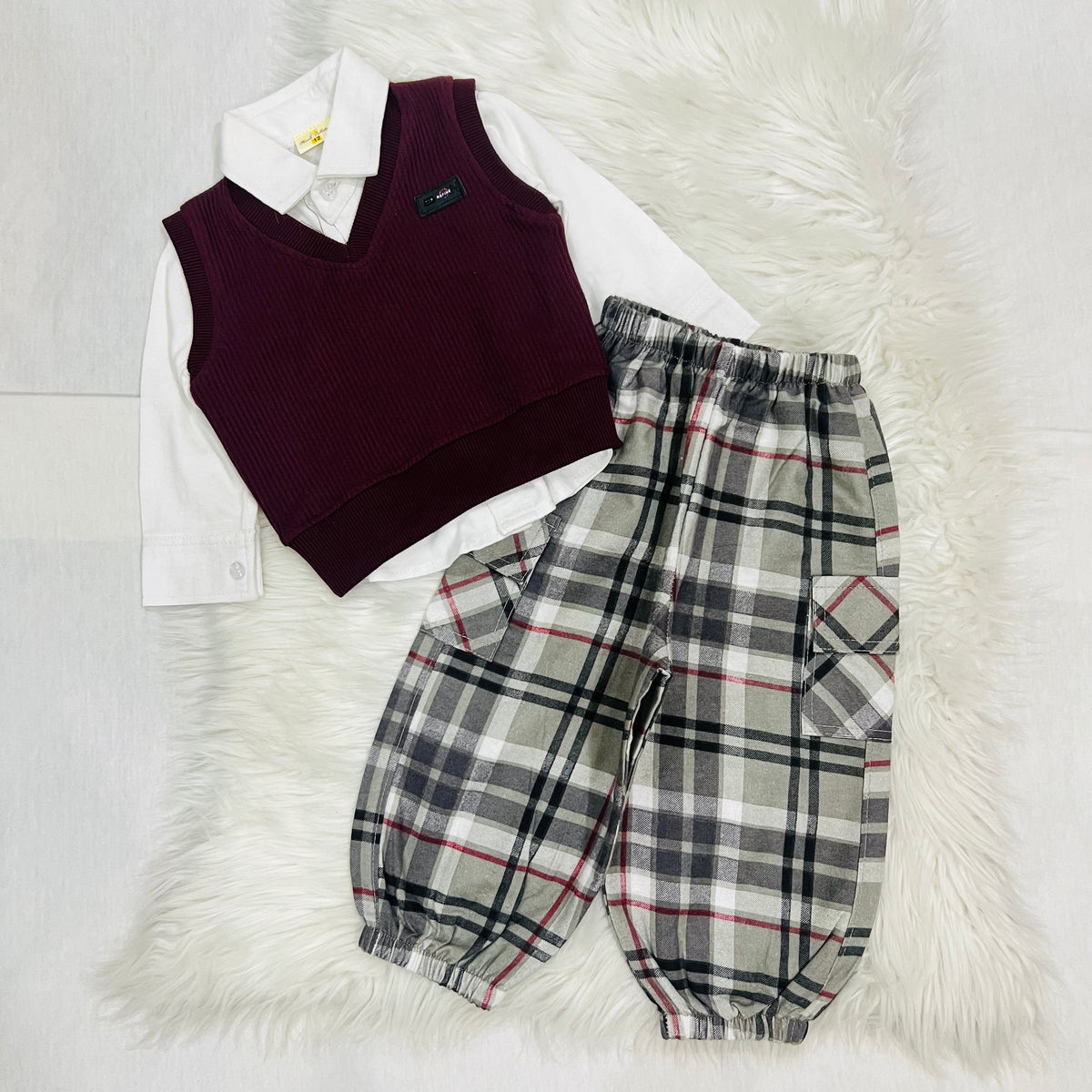 3- piece set featuring a V-neck ribbed sweater vest layer paired with check  trousers/joggers fleece stuff