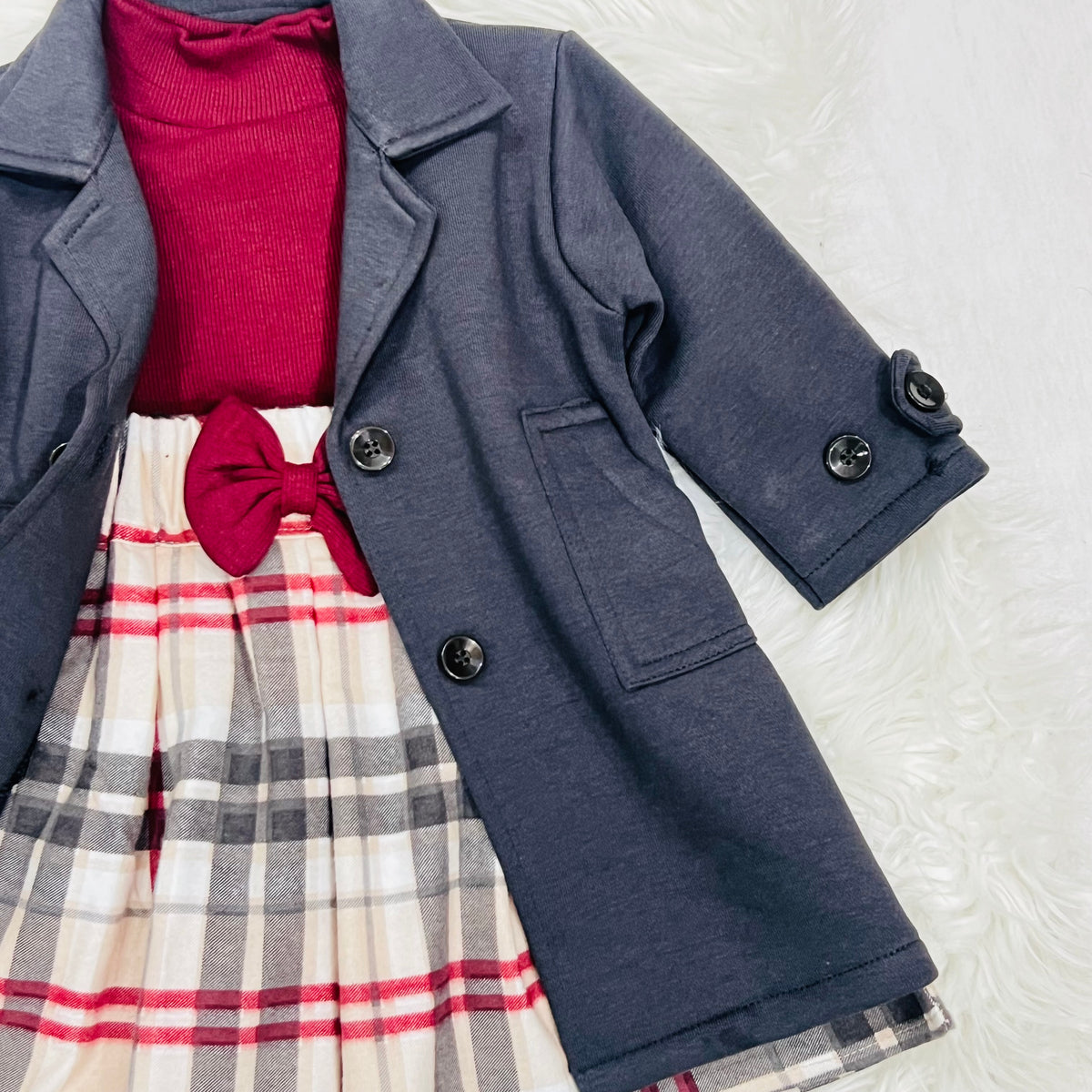 "Classy charcoal  grey trench-style blazer jacket dress paired with a beige plaid skirt."
 "Stylish girls' 2-piece layered outfit set featuring a double-breasted  charcoal grey coat and plaid pleated skirt."fleece stuff winter