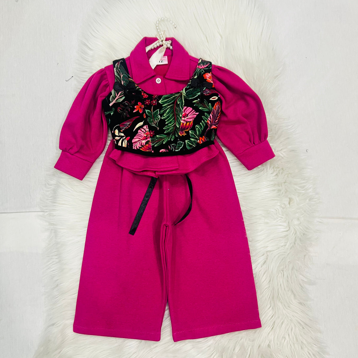 Effortless style meets vibrant tropical prints. Featuring a bright pink long-sleeve top paired with a floral corset-style overlay, wide-leg trousers winter fleece stuff (Copy 3)