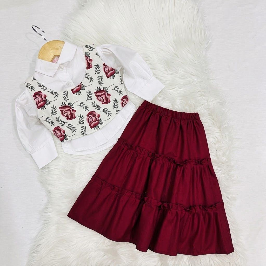 White Puff-sleeve Button-up Blouse Layered With White Floral Print Corest Top Paired With Vibrant Maroon Tiered Ruffle Skirt