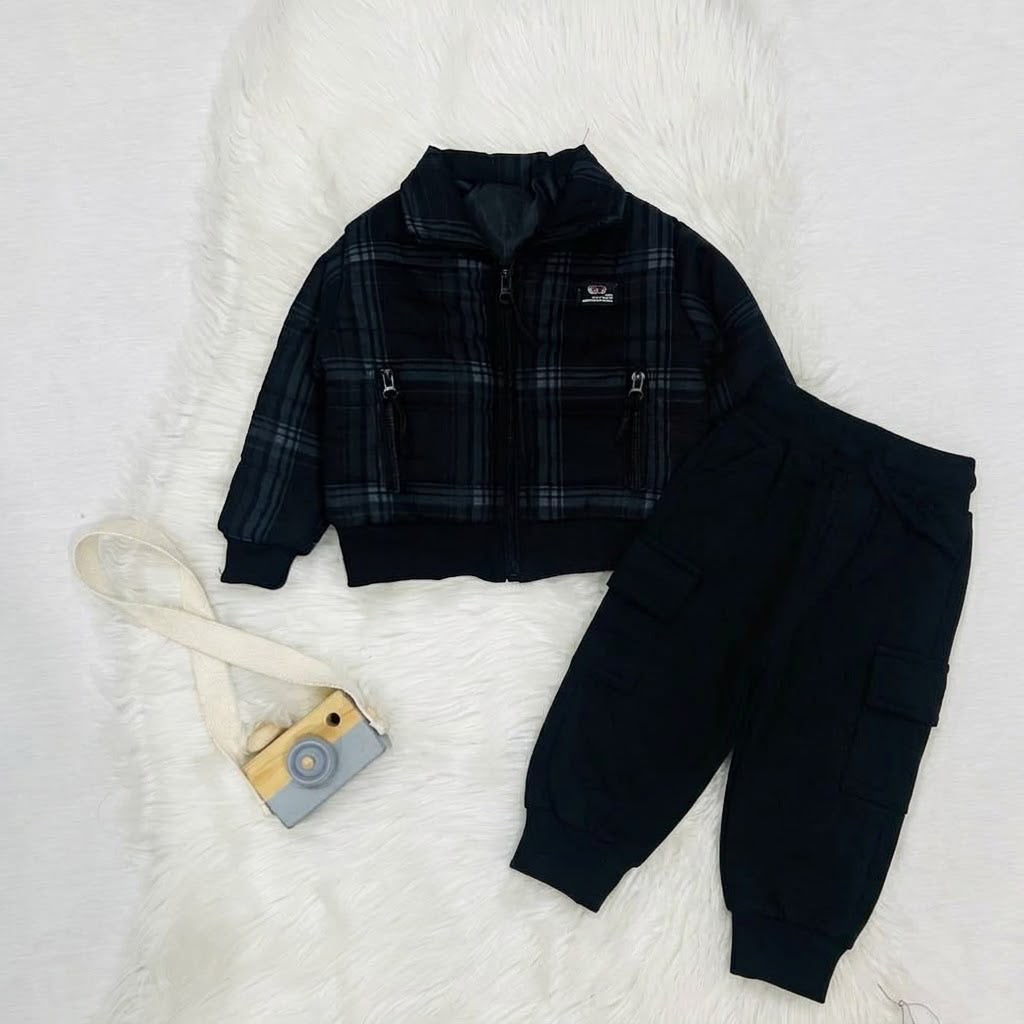 Cozy season, but make it cool. ⚡️ Keep your little one warm and effortlessly stylish in this plaid puffer jacket and cargo fleece winter pants set