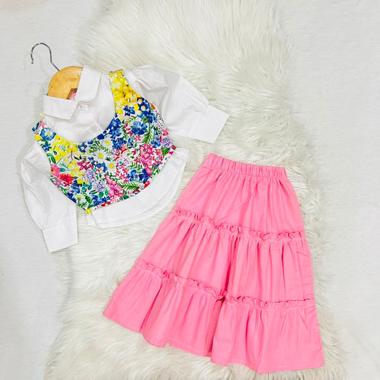 White Button-Down Shirt Layered With Vibrant, Multicolored Floral Print Corest Top & Paired With Tiered Pink Ruffled Skirt Cotton Stuff
