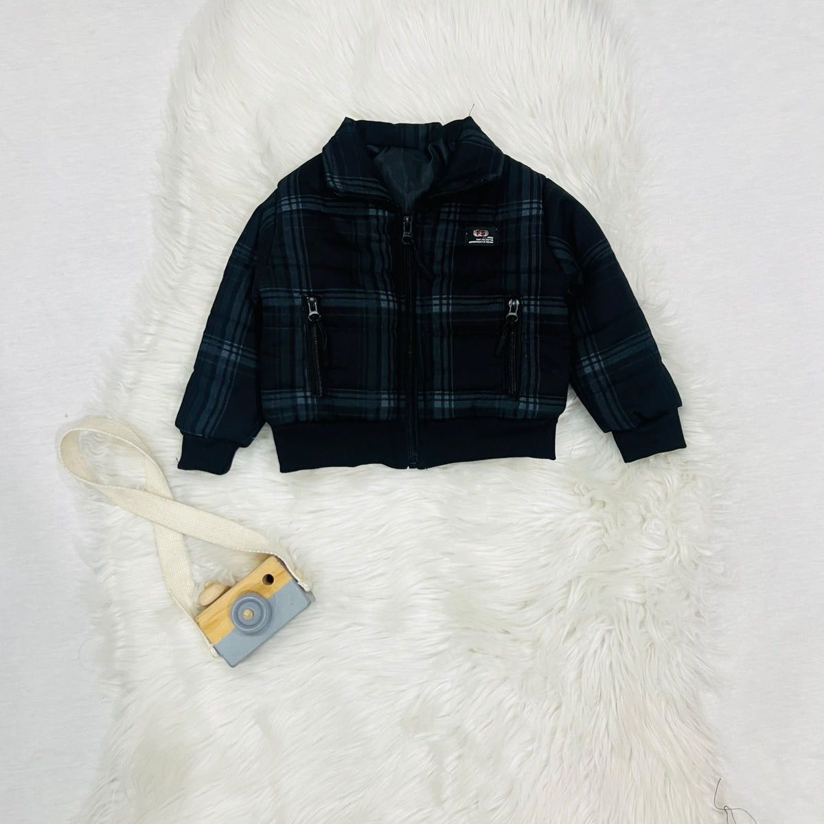 Cozy season, but make it cool. ⚡️ Keep your little one warm and effortlessly stylish in this plaid puffer jacket and cargo fleece winter pants set