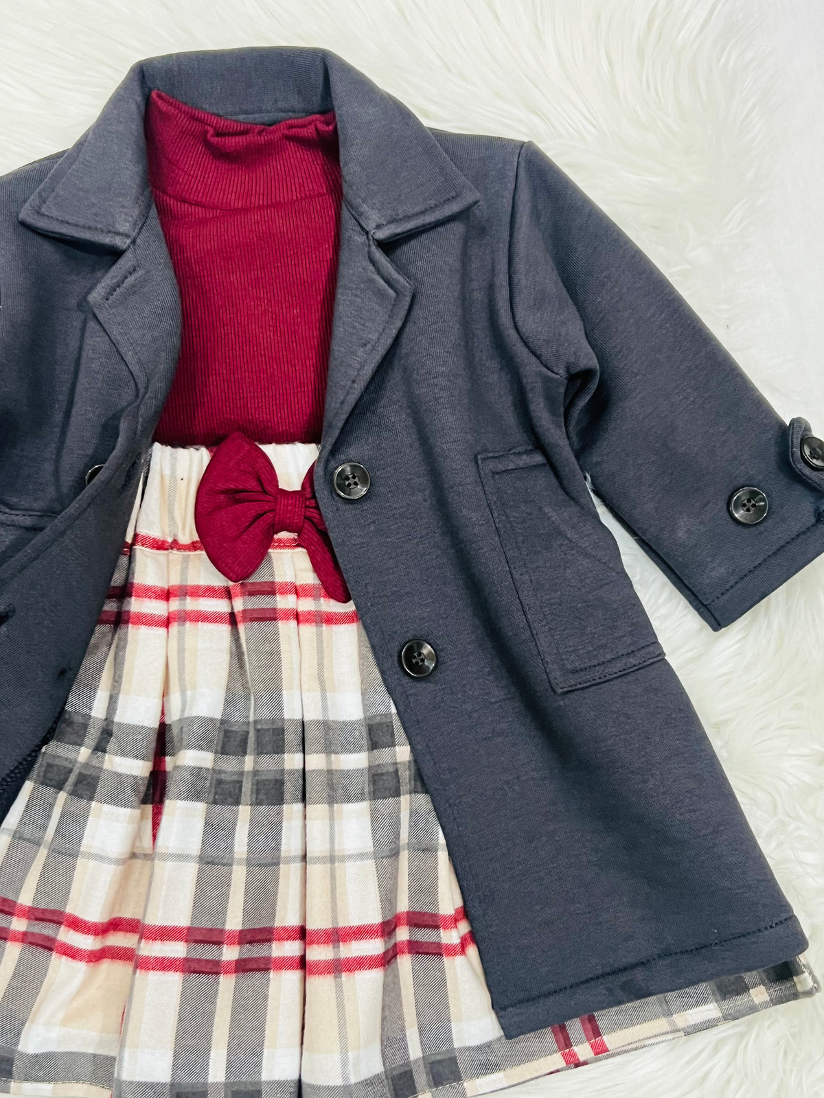 "Classy charcoal  grey trench-style blazer jacket dress paired with a beige plaid skirt."
 "Stylish girls' 2-piece layered outfit set featuring a double-breasted  charcoal grey coat and plaid pleated skirt."fleece stuff winter