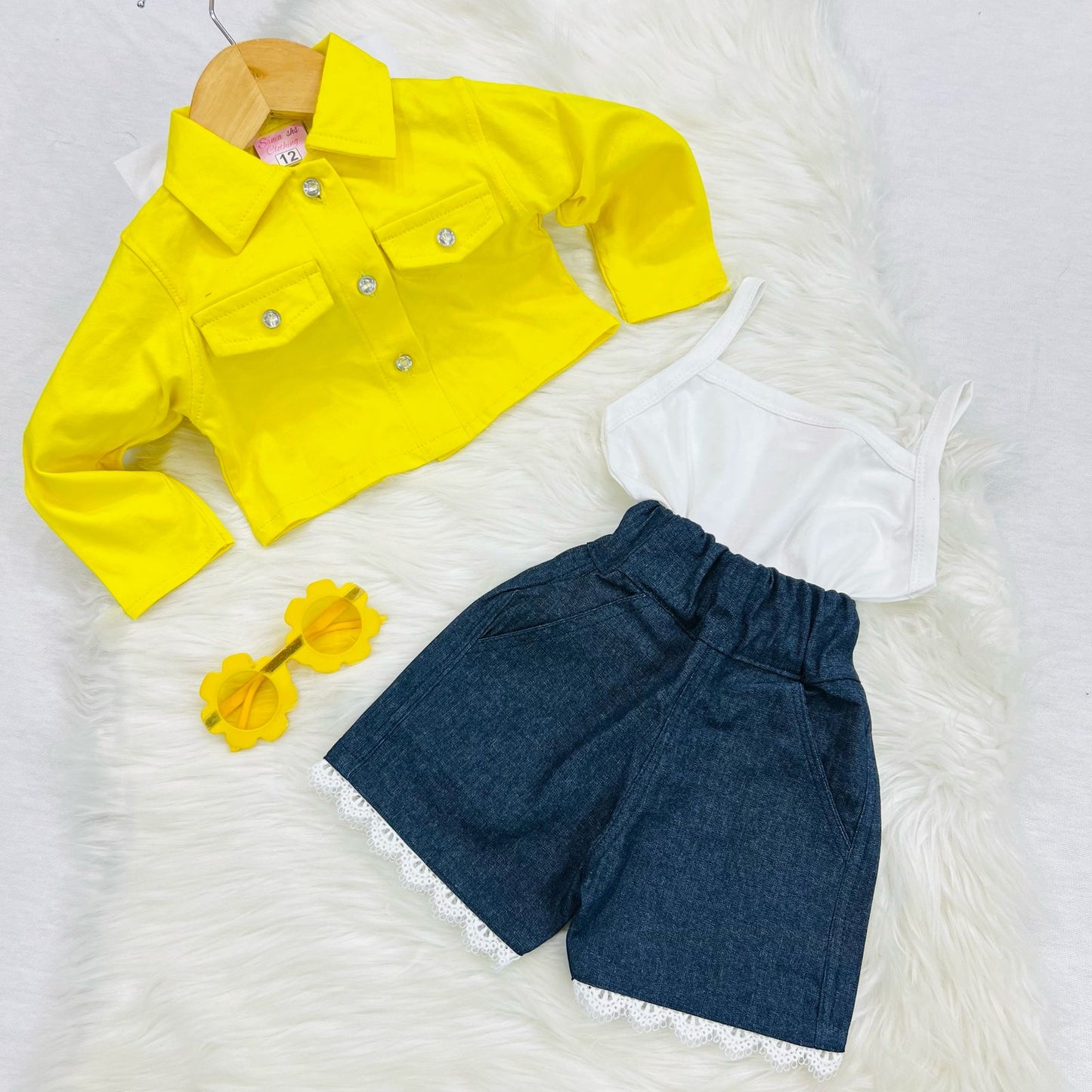 White Camisole Top Yellow Jacket Navy Denim Shorts
