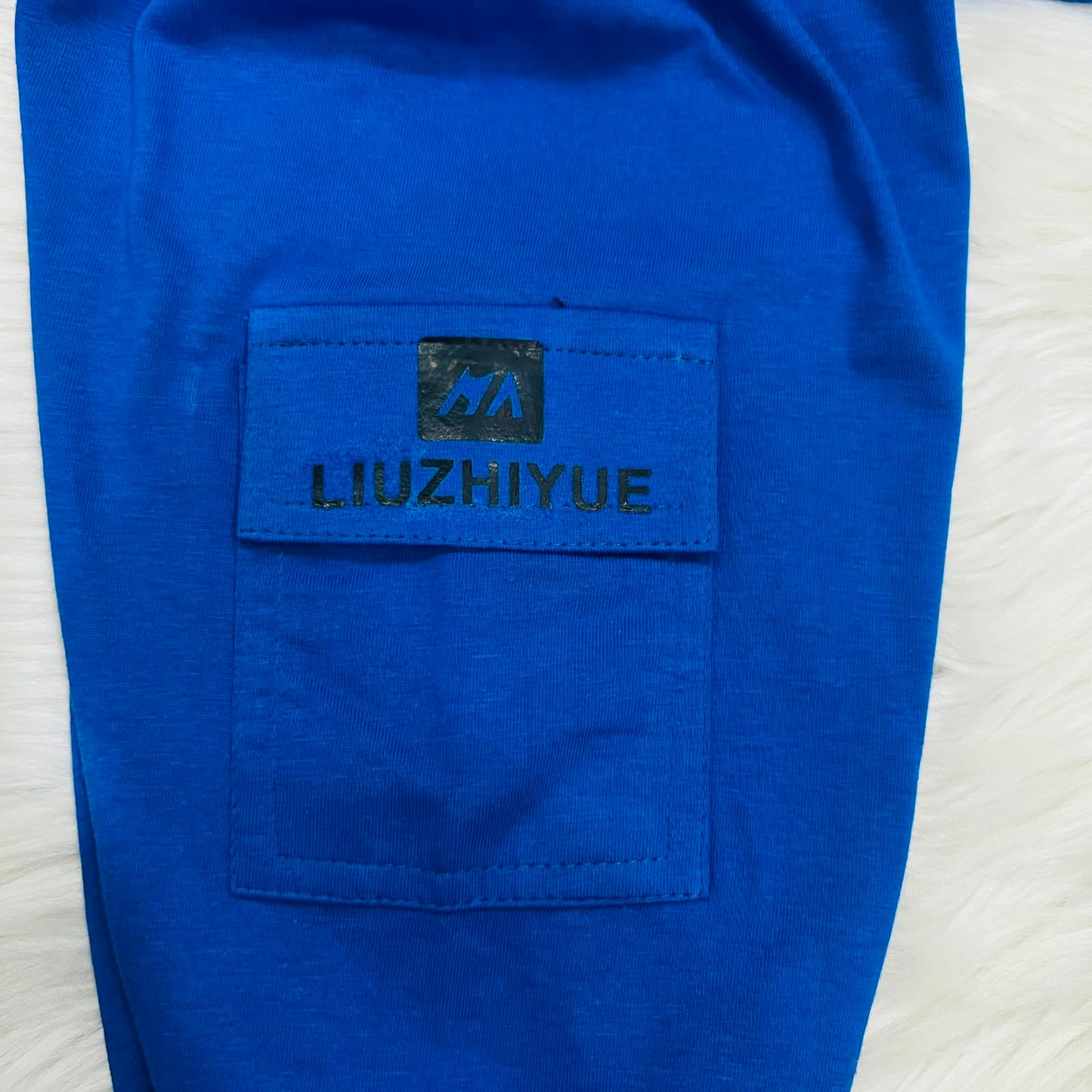 Sleeveless Hoodie & Cargo Pants Set Features A  Blue Color & A Letter "R" Patch On The Chest Blended Stuff