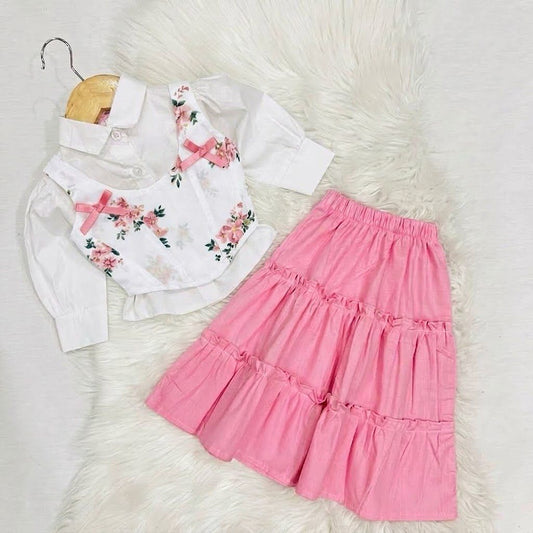 White Button-down Shirt Layered With Vibrant, Multicolored Floral Print Corest Top & Paired With Tiered Baby Pink Ruffled Skirt Cotton Stuff