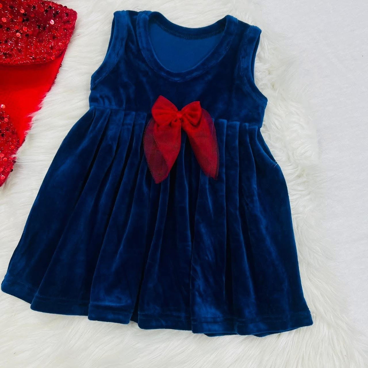 A red sequin jacket and blue velvet party dress set for baby girls