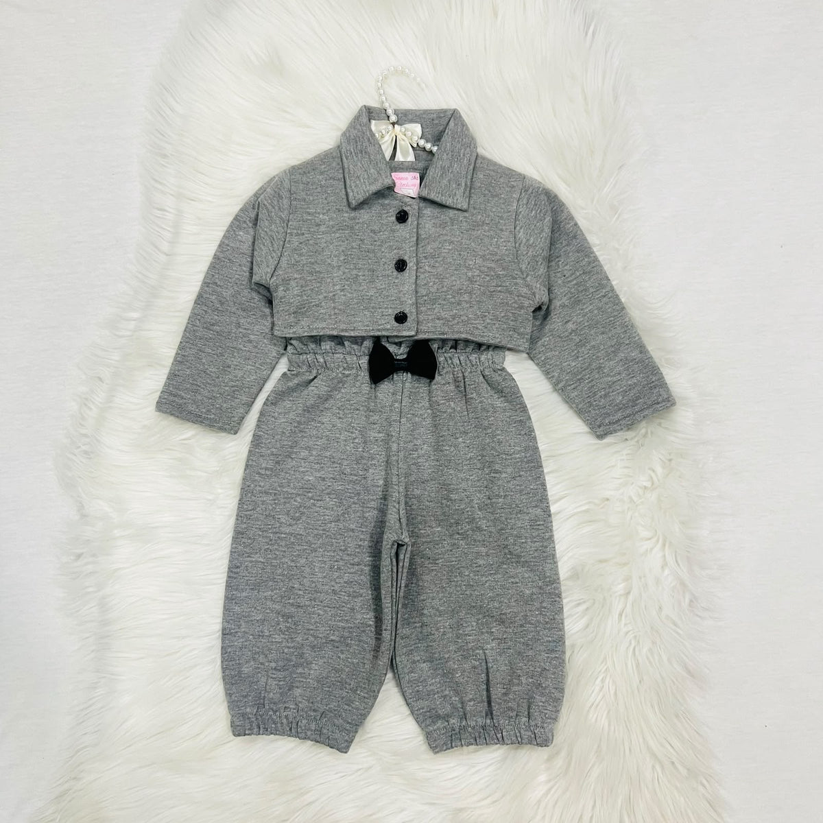 Gray two-piece baby girl outfit featuring a sleeveless romper with a black bow and a matching long-sleeve button-down jacket fleece winter stuff