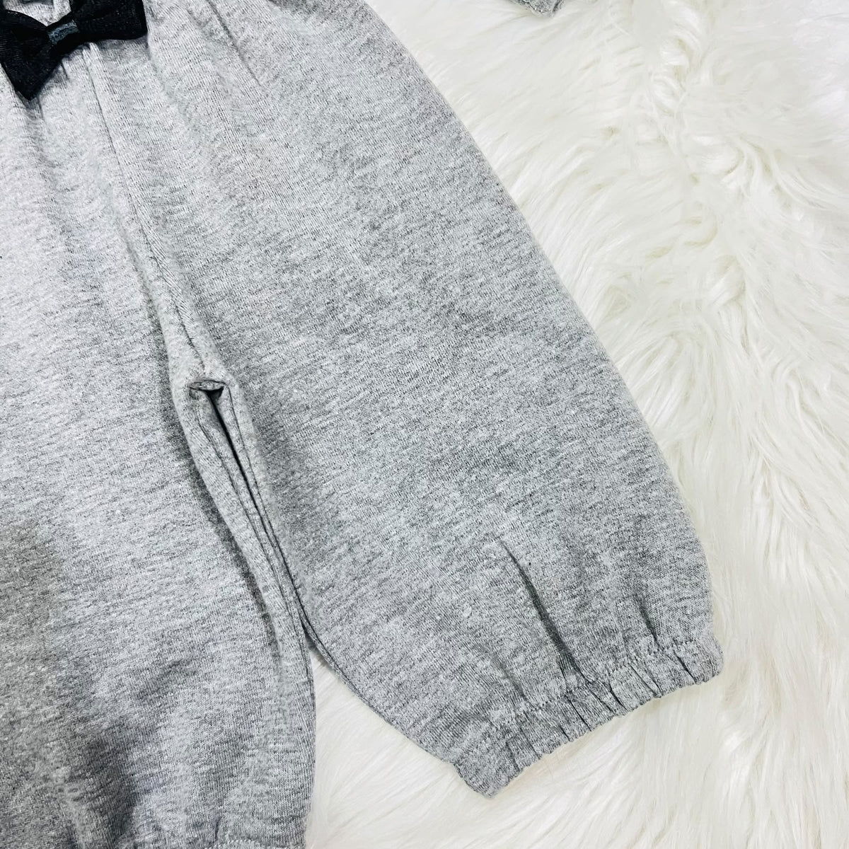 Gray two-piece baby girl outfit featuring a sleeveless romper with a black bow and a matching long-sleeve button-down jacket fleece winter stuff