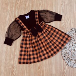 BLACK top net sleeves / orange check skirt