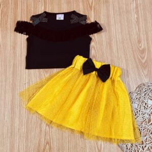 Black top sleeveless/ yellow net skirt